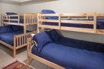 Private Den with 2 Twin over Double Bunk Beds 